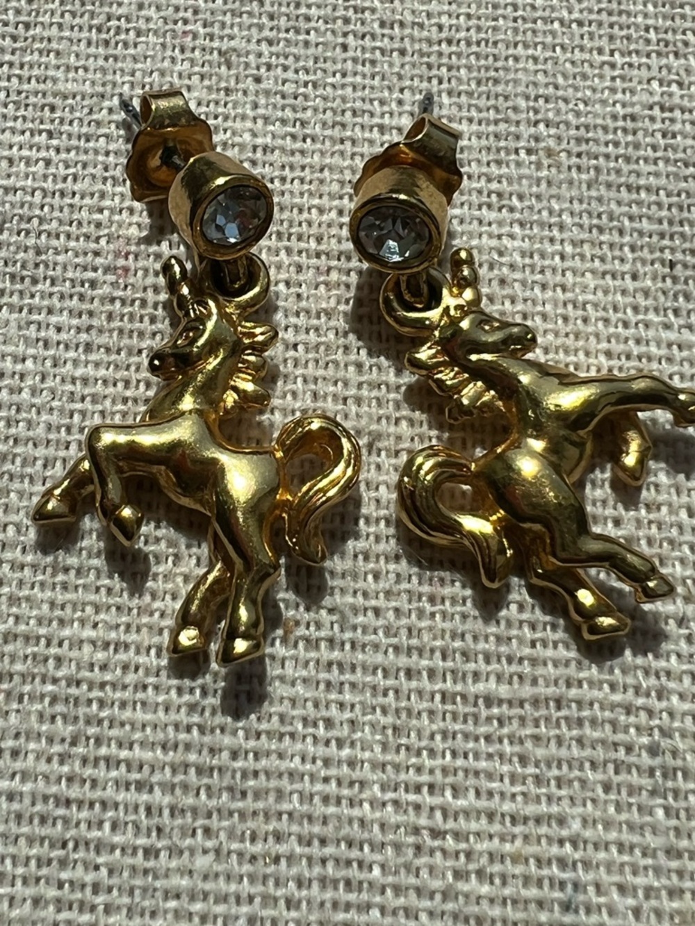 Vintage Goldtone Unicorn Dangle Earrings with Clear Stone Studs..